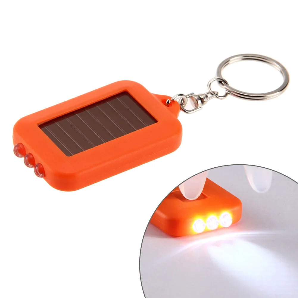 Tragbare LED-Schlüsselanhänger-Solarlampe – Mini-Taschenlampe mit Schlüsselring | Solarbetriebenes Licht für Outdoor, Wandern & Alltag Kaufschwan® Orange