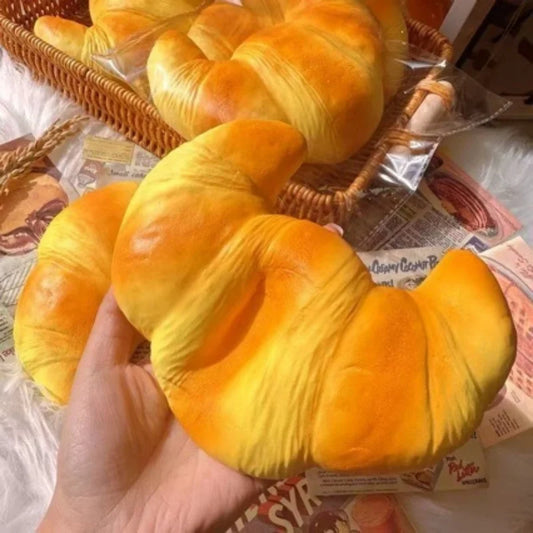 Croissant-Squishy-Stressball – Weiches Klebriges Slow-Rising Brot-Knautsch-, Fidget- & Sensorikspielzeug für Entspannung & Partygeschenke Kaufschwan®