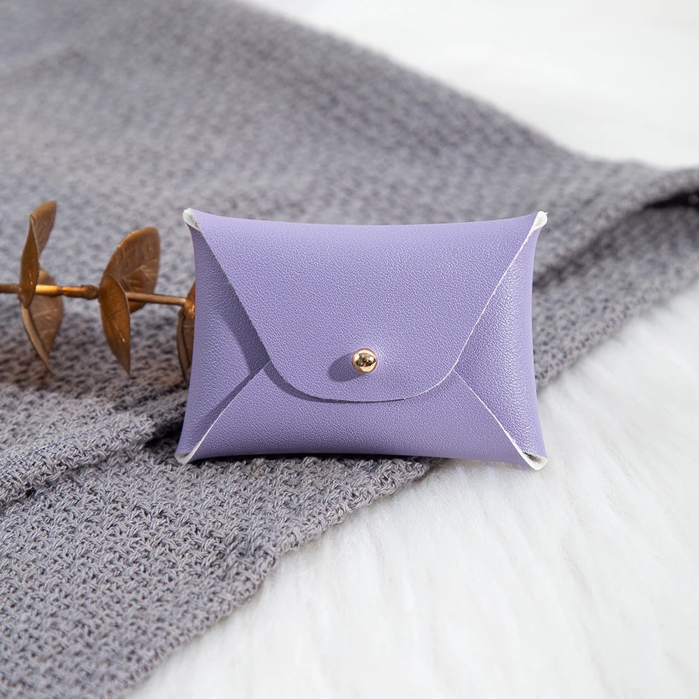 100 Stück Silberne Schmuckbeutel mit Logo – 10x7cm Lederbeutel mit Kordelzug | Für Ohrringe, Ringe, Halsketten, Münzen & Schlüsselanhänger