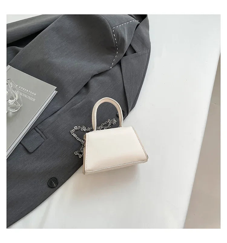 Bunte Schultertasche mit Schmetterlingsknoten – PU Leder Crossbody Ketten-Satchel & Handtasche für Damen