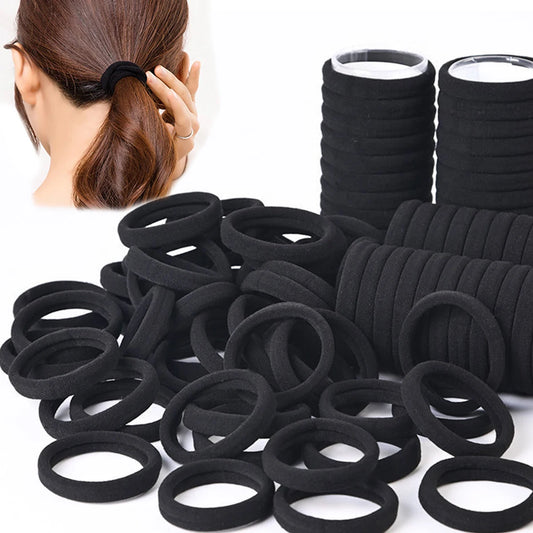 Großpackung mit 50 oder 100 hochwertigen schwarzen Haargummis – geeignet für alle Haartypen und Frisuren. Kaufschwan®